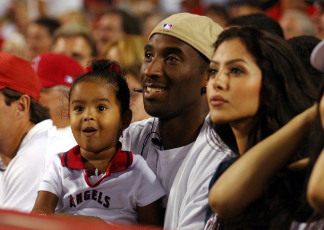 kobe with wife and daughter at angels game in 2005