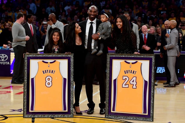 kobe bryant and his family at his retirement  ceremony at staples center