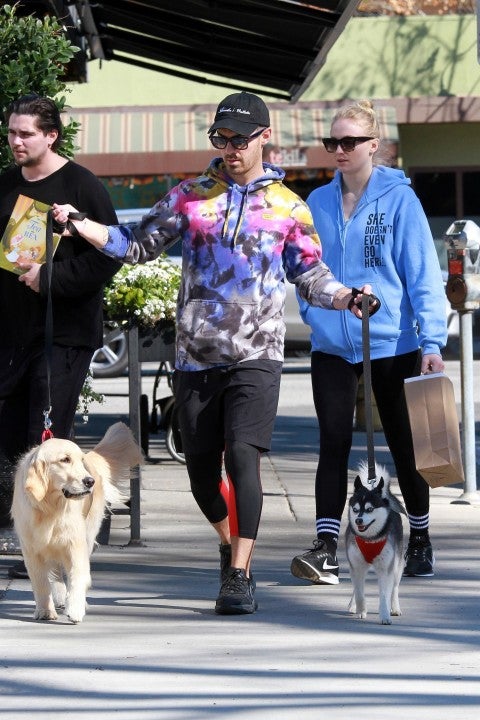 Joe Jonas and Sophie Turner and dogs at sweet butter