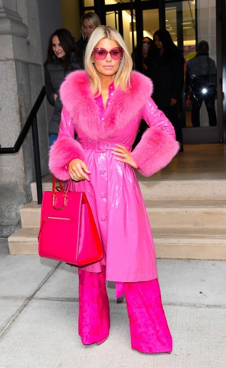 Jessica Simpson leaves BuzzFeed on February 4 in neon pink outfit