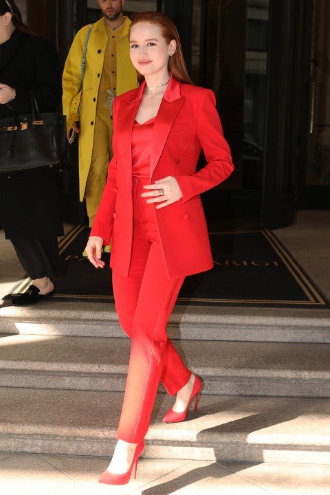 Madelaine Petsch in red during milan fashion week