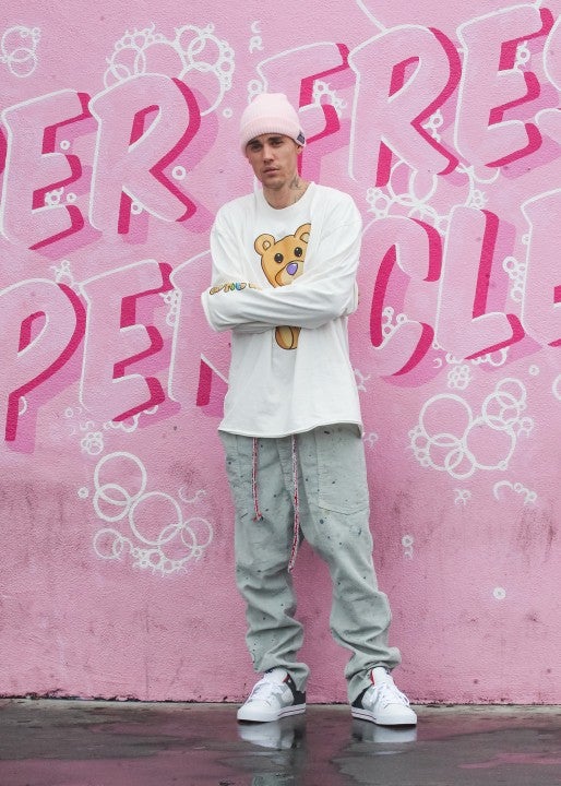 Justin Bieber against pink wall in LA