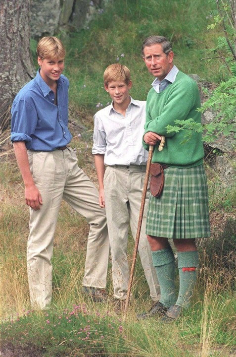 Prince William poses for photographers August 1997 along with Prince Harry and Prince Charles at Balmoral, Scotland