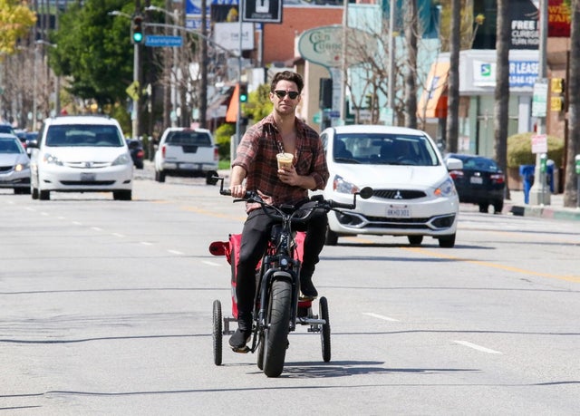 Sasha Farber rides his bike through Los Angeles on March 22.