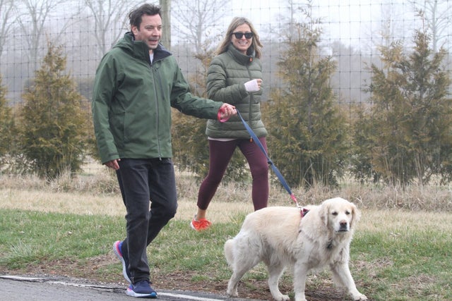 Jimmy Fallon and wife walk their dog in the hamptons