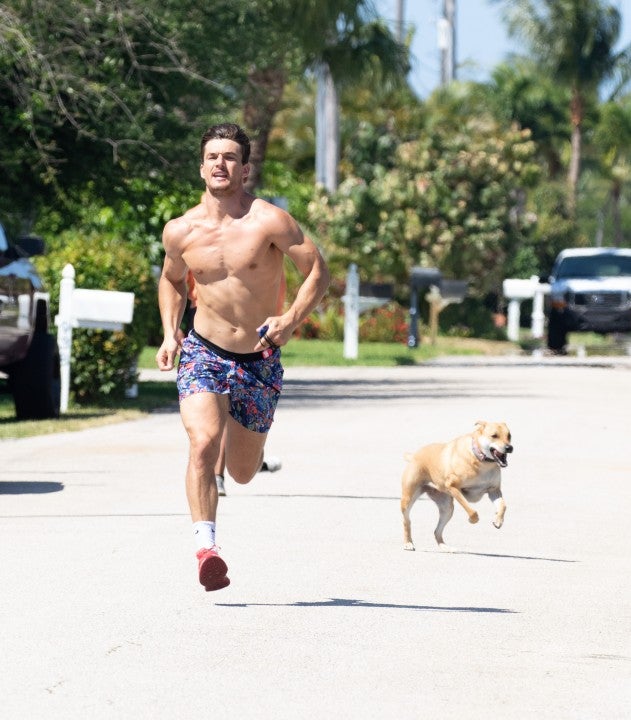 tyler cameron and his dog running in miami