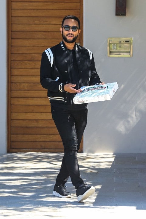 john legend leaves donuts for paparazzi