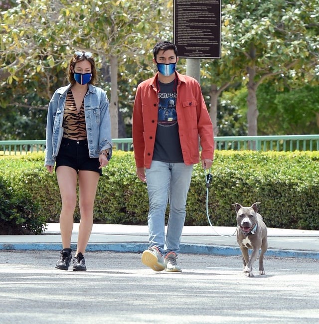 henry golding and wife walk dog