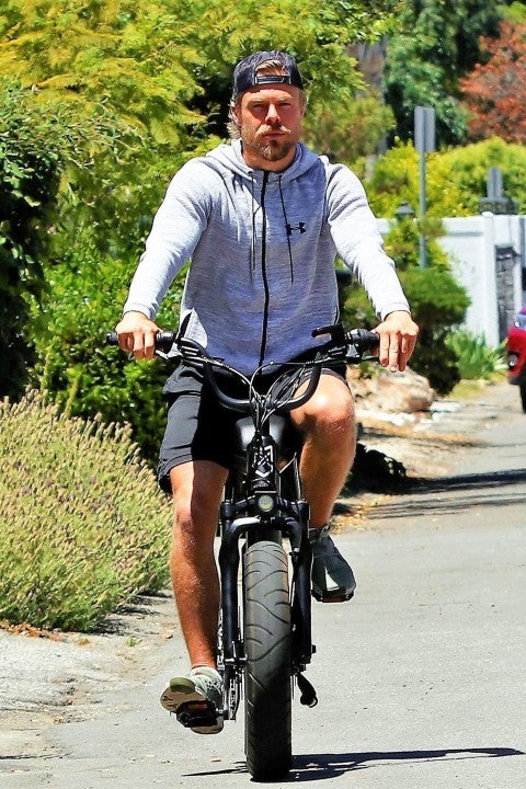 derek hough on electric bike in LA