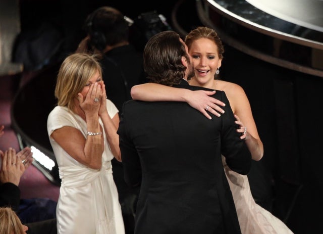 Jennifer Lawrence with mom and bradley cooper at 2013 oscars
