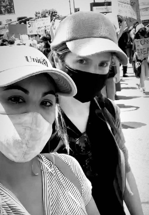 anna kendrick and chrissie fit protesting