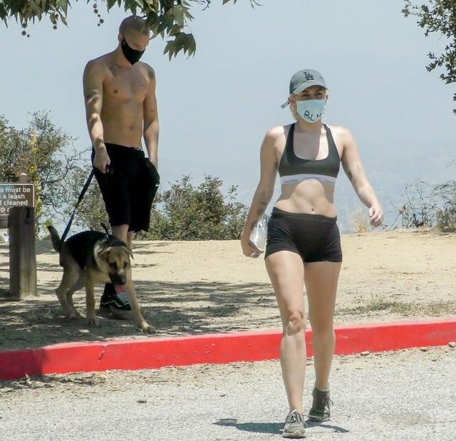 Cody Simpson and Miley Cyrus hike with dogs
