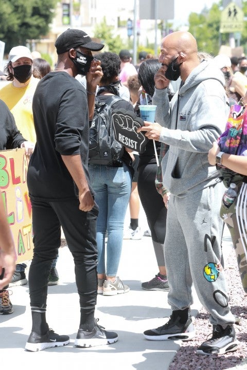 Chris Paul and Common at protests