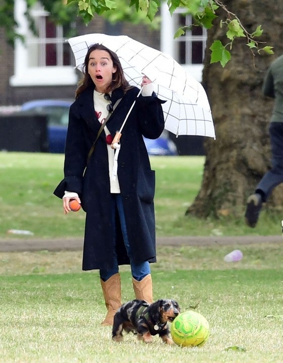 Emilia Clarke with her dog in london