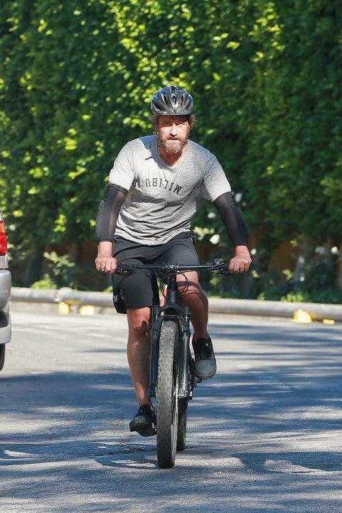 gerard butler on bike in santa monica