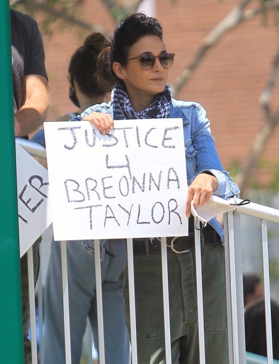Emmanuelle Chriqui at protest