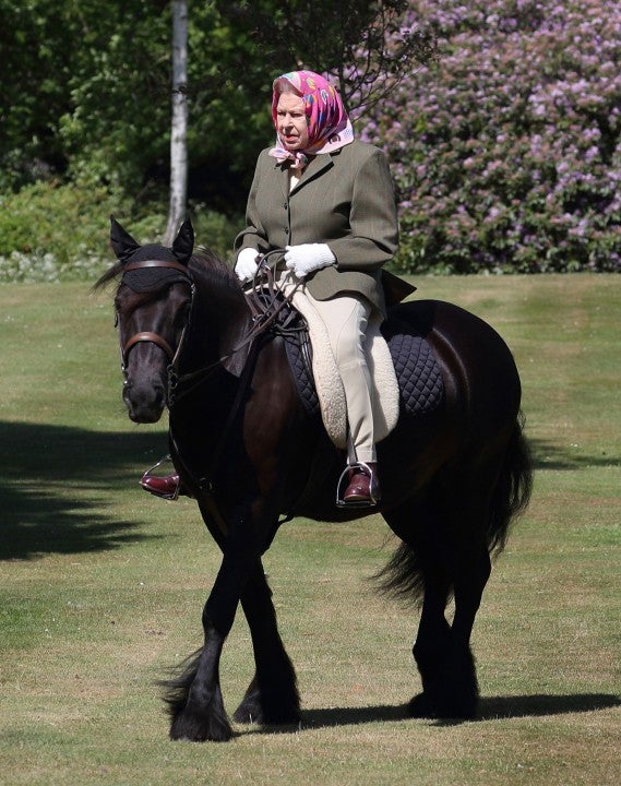 Queen Elizabeth II rides pony