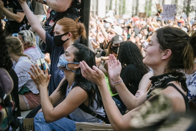 Madelaine Petsch and Camila Mendes at protests