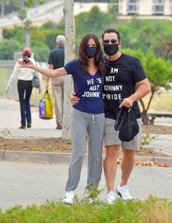 Courteney Cox and friend with not johnny shirts