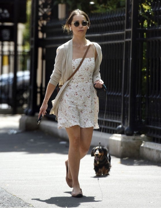 Emilia Clarke and her dog in london