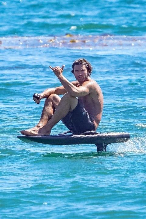 Brody Jenner surfing in malibu