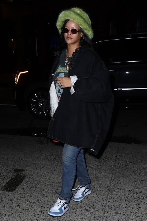 Rihanna shows off her stunning legs in nothing but a camo cardigan and a Louis  Vuitton purse