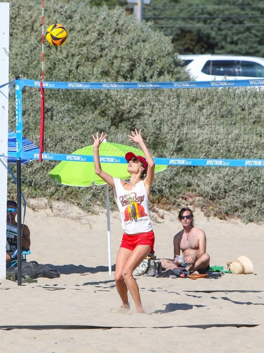 Alessandra Ambrosio plays beach volleyball