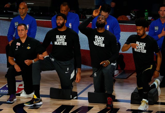 lakers in blm shirts on kobe bryant day