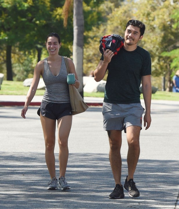 Henry Golding and wife at park in la