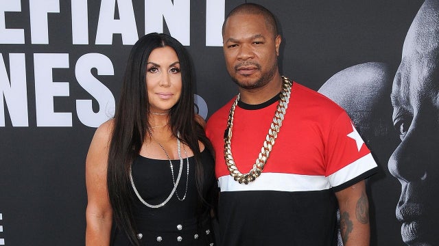 Xzibit and wife Krista Joiner attend the Premiere of HBO's 'The Defiant Ones' at Paramount Theatre.