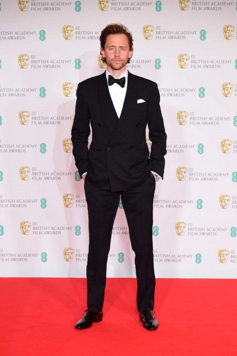Tom Hiddleston arrives for the EE BAFTA Film Awards at the Royal Albert Hall in London. 