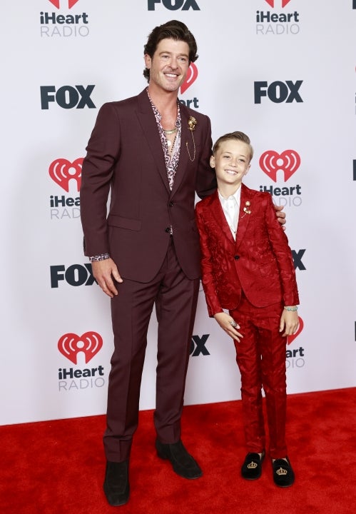  Robin Thicke and Julian Fuego Thicke attend the 2021 iHeartRadio Music Awards at The Dolby Theatre in Los Angeles, California, which was broadcast live on FOX on May 27, 2021.
