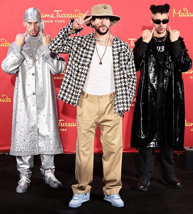 Bad Bunny (C) reveals wax figures for Madame Tussauds New York and Madame Tussauds Orlando at Madame Tussauds on April 19, 2022 in New York City.