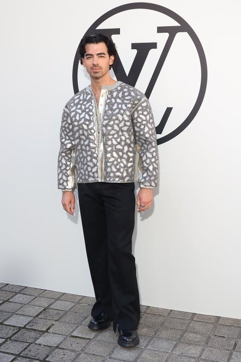 Joe Jonas attends the Louis Vuitton show as part of Paris Fashion Week