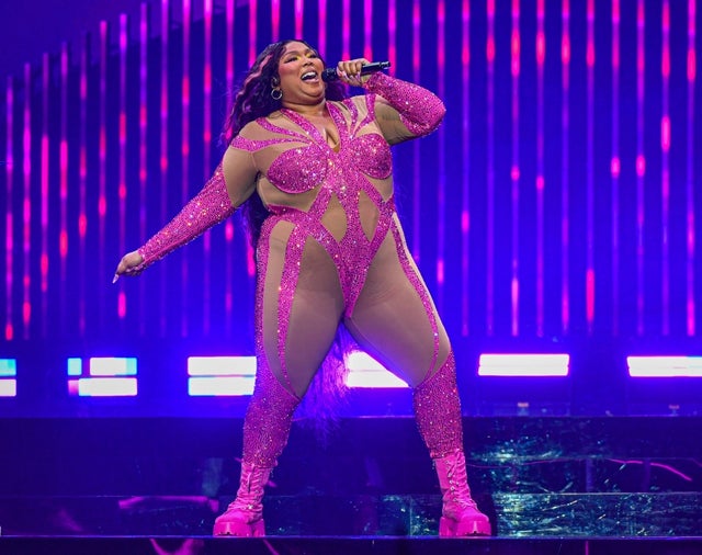 Lizzo performs onstage at Little Caesars Arena