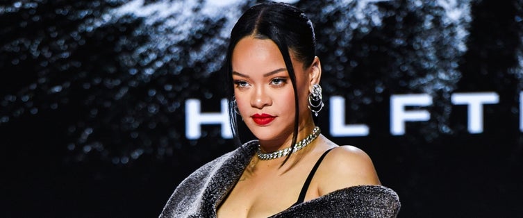Rihanna slips into yellow lingerie to show off Savage Summer line