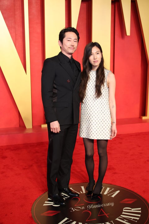 Steven Yeun and Joana Pak