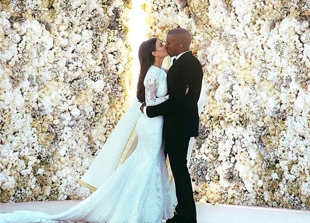 kim kardashian and kanye west kiss at 2014 wedding