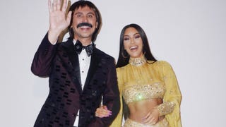 Kim Kardashian and Her Amazing Abs Channel Cher For Halloween:  See the Video!