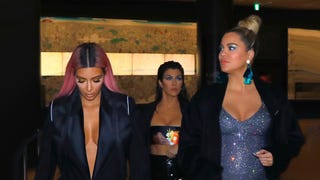 Pregnant Khloe Kardashian Sparkles With Sisters Kim and Kourtney in Tokyo 