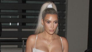 Kim Kardashian Steps Out for Dinner With Friends in Sexy White Number