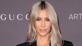 Kim Kardashian Rocks Flashy Jewelry for the First Time Since Paris Robbery -- See Her New Grill!