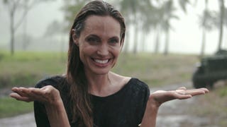 EXCLUSIVE: Angelina Jolie Gets Caught in the Rain Behind the Scenes of 'Unbroken'