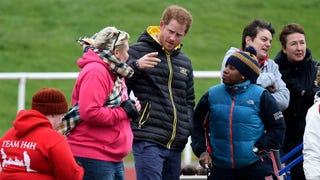 Prince Harry Helps Woman Who Fell From Her Wheelchair -- See the Pics!
