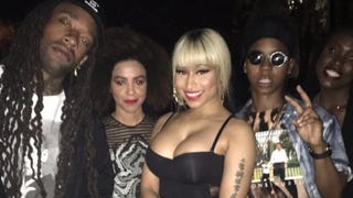 Nicki Minaj Has a Near-Wardrobe Malfunction in Skintight Black Dress