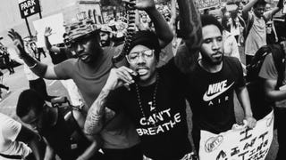 EXCLUSIVE: Nick Cannon Speaks Out on Shootings, Leads NYC Protests
