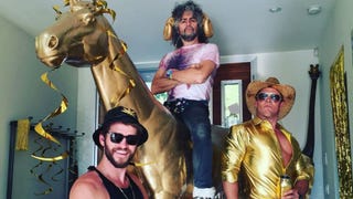 Miley Cyrus and Liam Hemsworth Party in Gold -- See the Fun Pics!
