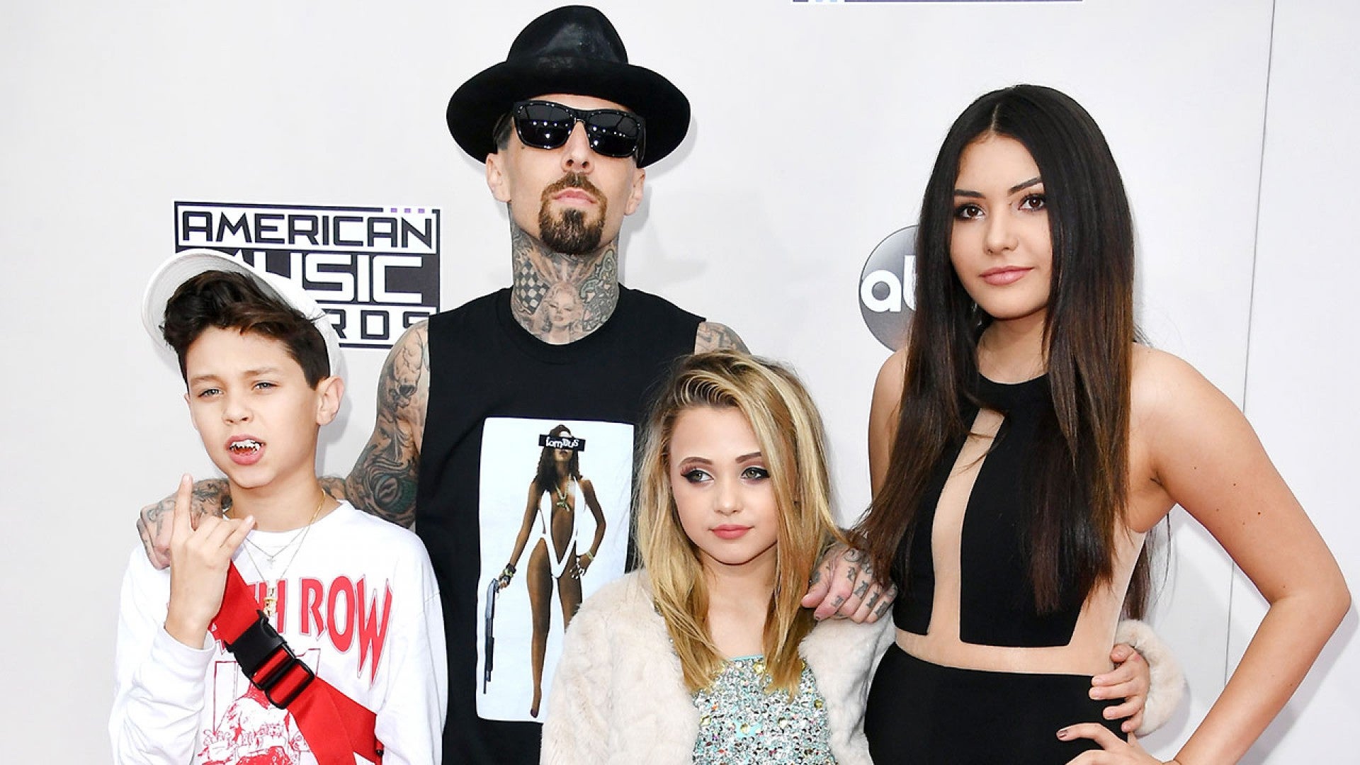 Exclusive Travis Barker Brings His Adorable Kids To The Amas This Is My Support Group Entertainment Tonight Travis barkers drum stick from slc concert in 2004. exclusive travis barker s kids gush over their dad