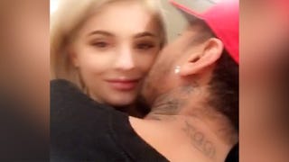 Kylie Jenner Cuddles Up to Boyfriend Tyga at Friendsgiving Feast