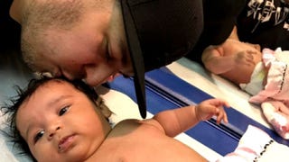Rob Kardashian Adorably Cuddles and Kisses Daughter Dream